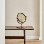 An unusual and large Victorian circular dressing mirror