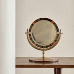 An unusual and large Victorian circular dressing mirror
