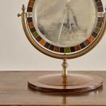 An unusual and large Victorian circular dressing mirror