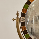An unusual and large Victorian circular dressing mirror