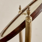 An unusual and large Victorian circular dressing mirror