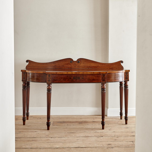 A fine and large late Regency mahogany and ebony inlaid serving table