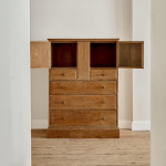 An Arts & Crafts limed oak cabinet by Ambrose Heal for Heal's