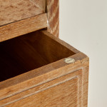 An Arts & Crafts limed oak cabinet by Ambrose Heal for Heal's