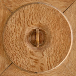An Arts & Crafts limed oak cabinet by Ambrose Heal for Heal's