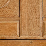 An Arts & Crafts limed oak cabinet by Ambrose Heal for Heal's