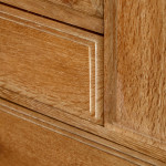 An Arts & Crafts limed oak cabinet by Ambrose Heal for Heal's