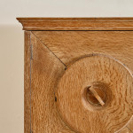 An Arts & Crafts limed oak cabinet by Ambrose Heal for Heal's