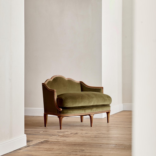 A small Art Deco giltwood settee in the manner of Poul Follot
