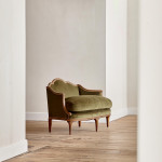 A small Art Deco giltwood settee in the manner of Poul Follot