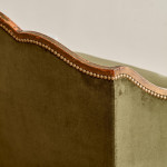 A small Art Deco giltwood settee in the manner of Poul Follot