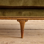 A small Art Deco giltwood settee in the manner of Poul Follot