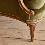 A small Art Deco giltwood settee in the manner of Poul Follot