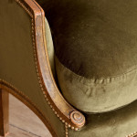 A small Art Deco giltwood settee in the manner of Poul Follot