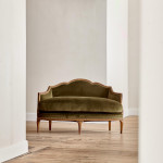A small Art Deco giltwood settee in the manner of Poul Follot (1877 - 1941)