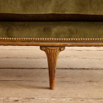 A small Art Deco giltwood settee in the manner of Poul Follot (1877 - 1941)