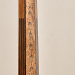 A narrow Regency penwork tripod table