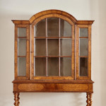 An unusual William & Mary style burr oak and seaweed marquetry glazed cabinet on stand
