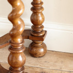An unusual William & Mary style burr oak and seaweed marquetry glazed cabinet on stand