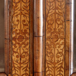 An unusual William & Mary style burr oak and seaweed marquetry glazed cabinet on stand