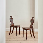 A set of four Regency mahogany hall chairs