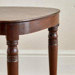 A set of four Regency mahogany hall chairs
