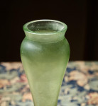 A rare and large iridescent 'Olympia' glass vase designed by Dr. Christopher Dresser (1834 - 1904) and made by Loetz for Max Emanuel, London
