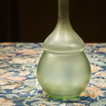 A rare and large iridescent 'Olympia' glass vase designed by Dr. Christopher Dresser (1834 - 1904) and made by Loetz for Max Emanuel, London