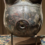 A bronze breastplate of the spirit deity, Jumadi
