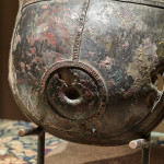 A bronze breastplate of the spirit deity, Jumadi
