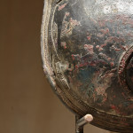 A bronze breastplate of the spirit deity, Jumadi