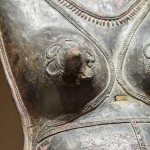 A bronze breastplate of the spirit deity, Jumadi