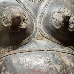A bronze breastplate of the spirit deity, Jumadi