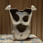 A bronze breastplate of the spirit deity, Jumadi