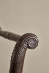 A large Regency faux rosewood curule stool in the manner of George Smith (1786 - 1828)