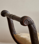 A large Regency faux rosewood curule stool in the manner of George Smith (1786 - 1828)
