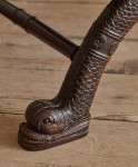A large Regency faux rosewood curule stool in the manner of George Smith (1786 - 1828)