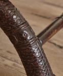 A large Regency faux rosewood curule stool in the manner of George Smith (1786 - 1828)