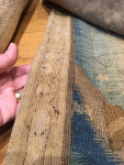 A large Flemish wool and silk blue verdure armorial  tapestry