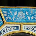 A rare Aesthetic movement octagonal enamelled glass mirror by James Powell & Sons