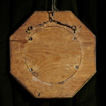 A rare Aesthetic movement octagonal enamelled glass mirror by James Powell & Sons
