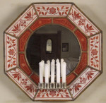 A rare Aesthetic movement octagonal enamelled glass mirror by James Powell & Sons
