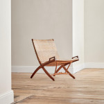 An early JH512 oak and rattan folding chair by Hans Wegner (1914 - 2007)