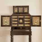 An exceptional ebony veneered and silk stumpwork Antwerp cabinet on stand