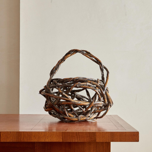 A large Meiji period woven and twisted bamboo ikebana basket