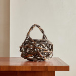 A large Meiji period woven and twisted bamboo ikebana basket