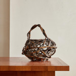 A large Meiji period woven and twisted bamboo ikebana basket