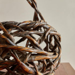 A large Meiji period woven and twisted bamboo ikebana basket