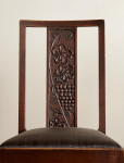 A set of four Secessionist carved oak side chairs by Michael Niedermoser (1835 - 1908)