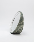 A Swedish Green marble and sterling silver elliptical mirror by Alex Foster (b. 1990)